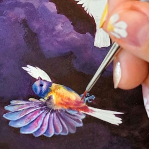 painting tiny bird with details