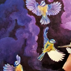 painting tiny birds